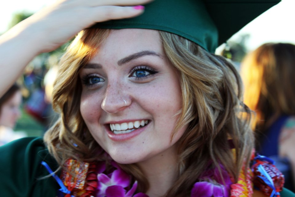 Graduate celebrating academic success at a commencement ceremony